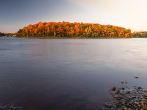 An Island with autumn coloured trees